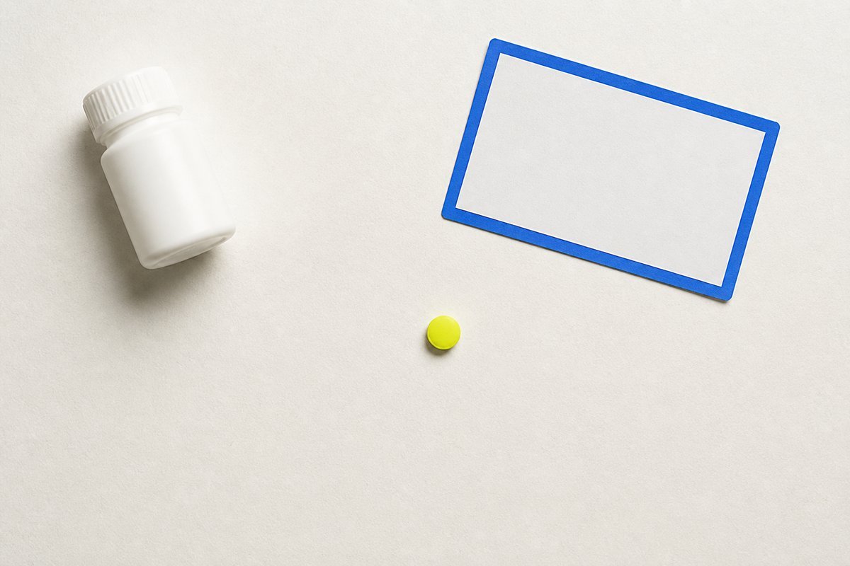 Bone review card, cobalt edge, lime chip: NSAID bottle far from 40 mg