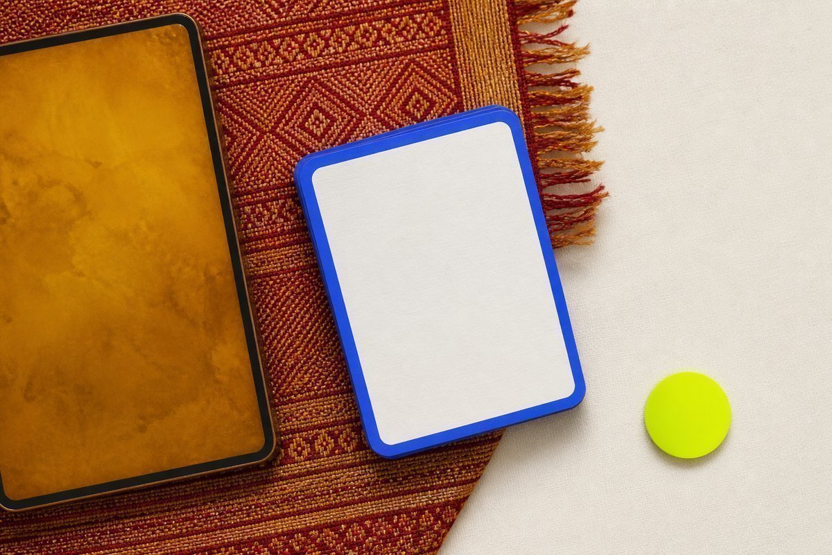 Bone review card, cobalt edge, lime chip: warm temple cloth, amber tablet